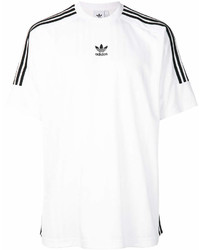 T-shirt girocollo a righe orizzontali bianca e nera di adidas