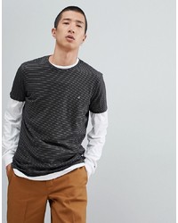T-shirt girocollo a righe orizzontali nera di Calvin Klein