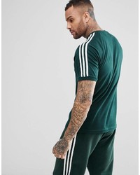 T-shirt girocollo a righe verticali verde scuro di adidas