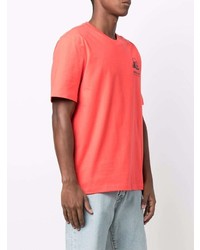 T-shirt girocollo arancione di adidas