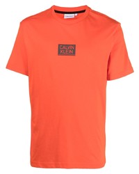 T-shirt girocollo arancione di Calvin Klein