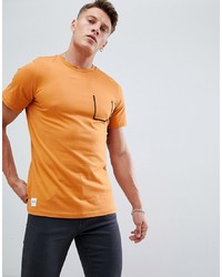 T-shirt girocollo arancione di NATIVE YOUTH