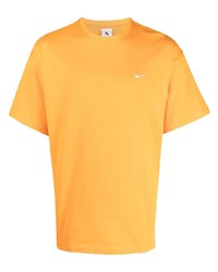 T-shirt girocollo arancione di Nike