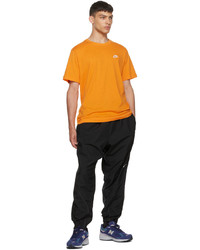 T-shirt girocollo arancione di Nike