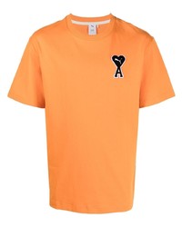T-shirt girocollo arancione di Puma