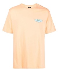 T-shirt girocollo arancione di Stussy