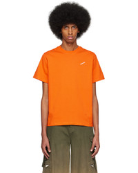 T-shirt girocollo lavorata a maglia arancione di Coperni