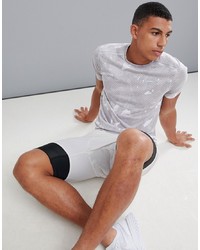 T-shirt girocollo mimetica grigia di Nike Running