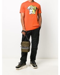 T-shirt girocollo ricamata arancione di Versace