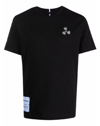 T-shirt girocollo ricamata nera di McQ