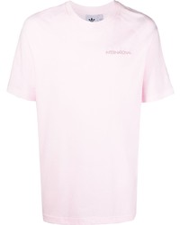 T-shirt girocollo rosa di adidas