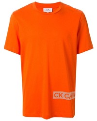 T-shirt girocollo stampata arancione di CK Calvin Klein