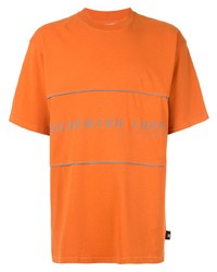 T-shirt girocollo stampata arancione di Gcds