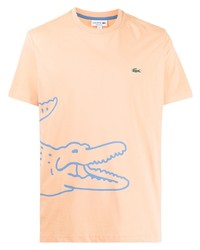 T-shirt girocollo stampata arancione di Lacoste