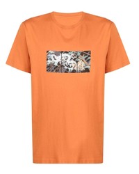 T-shirt girocollo stampata arancione di Maharishi