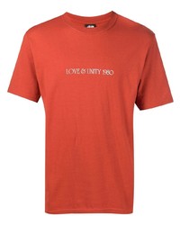 T-shirt girocollo stampata arancione di Stussy