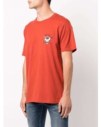 T-shirt girocollo stampata arancione di Stussy