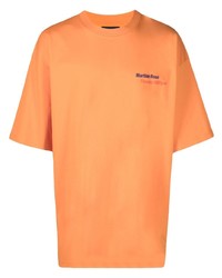 T-shirt girocollo stampata arancione di Tommy Jeans