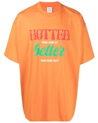 T-shirt girocollo stampata arancione di Vetements