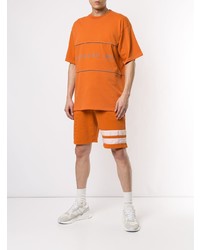 T-shirt girocollo stampata arancione di Gcds