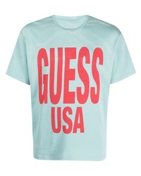 T-shirt girocollo stampata azzurra di GUESS USA