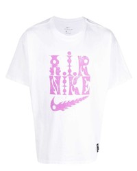 T-shirt girocollo stampata bianca e rosa di Nike