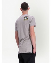 T-shirt girocollo stampata grigia di Comme des Garcons