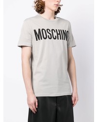 T-shirt girocollo stampata grigia di Moschino