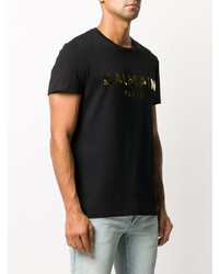 T-shirt girocollo stampata nera e dorata di Balmain