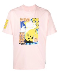 T-shirt girocollo stampata rosa di Nike