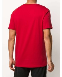 T-shirt girocollo stampata rossa di Moschino