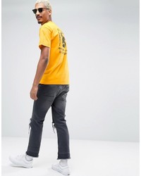 T-shirt stampata gialla di Obey